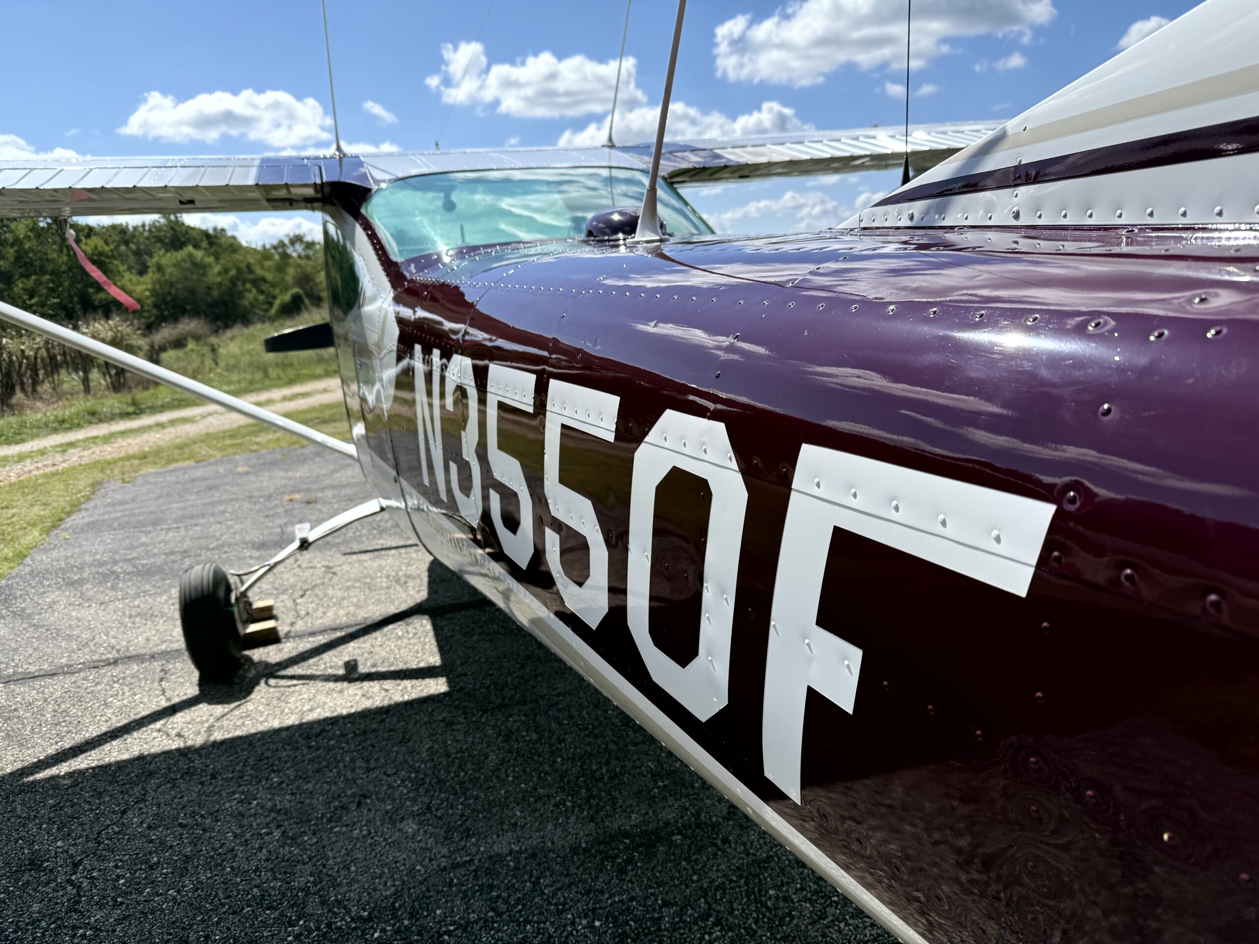 JL Specialties aviation detailing: aircraft after exterior dry wash and brightwork service