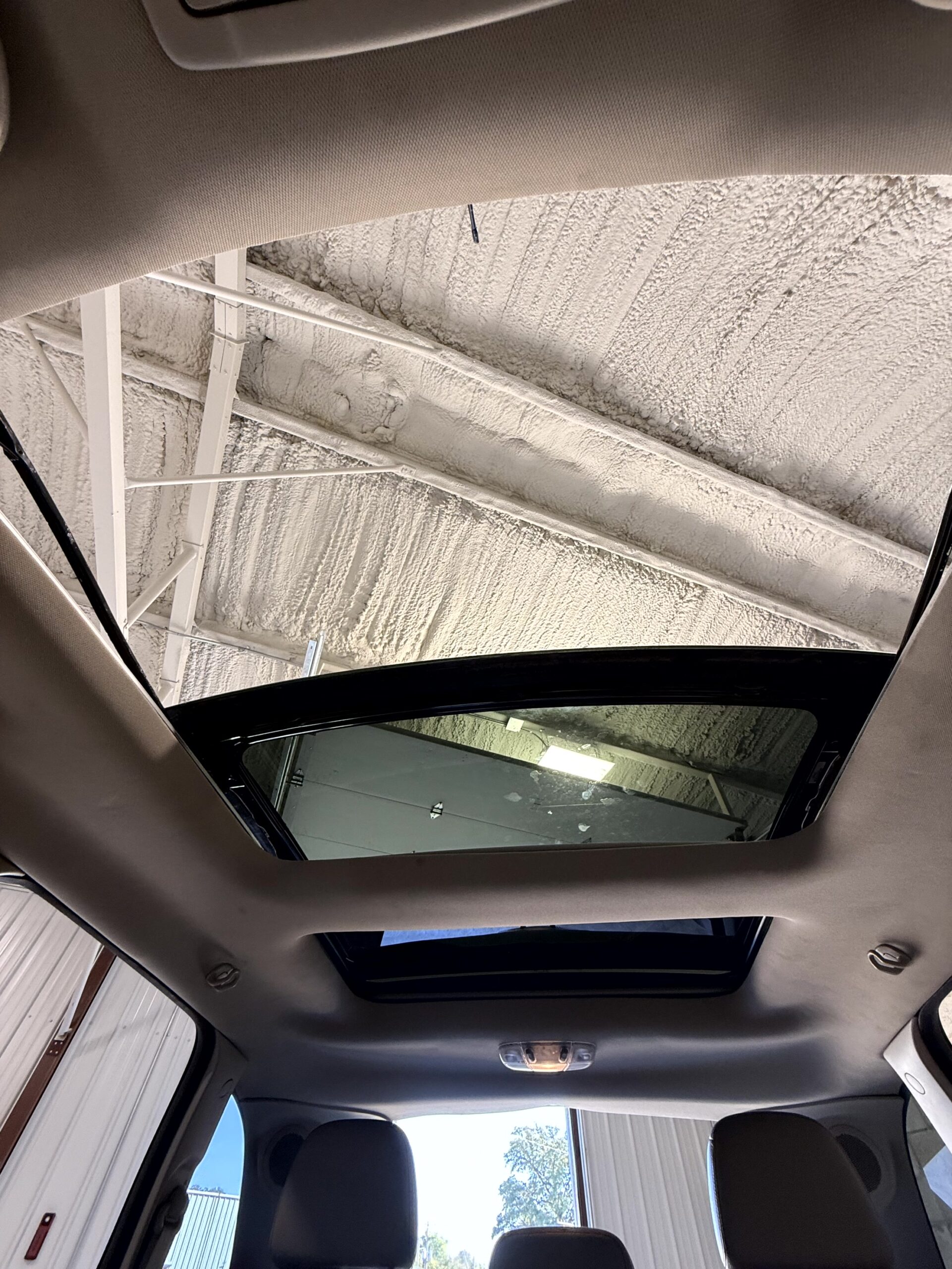 JL Specialties technician repairing a sunroof in West Plains MO