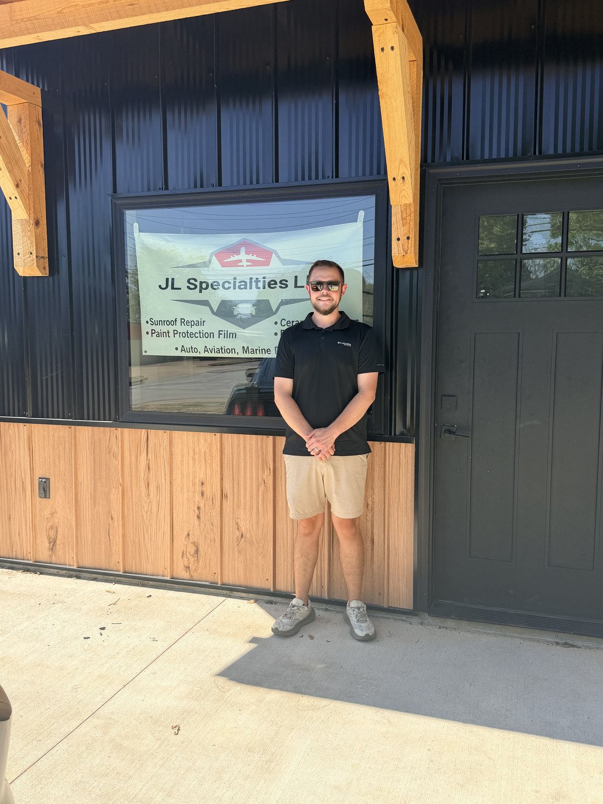 Jacob Acklin outside the JL Specialties shop