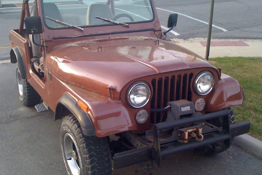 Front-mounted electric winch and fairlead installed on an off-road Jeep